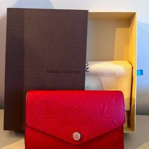 Red Louis Vuitton wallet